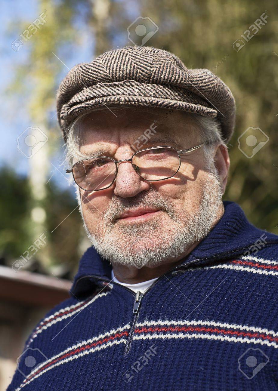 wearing a flat cap