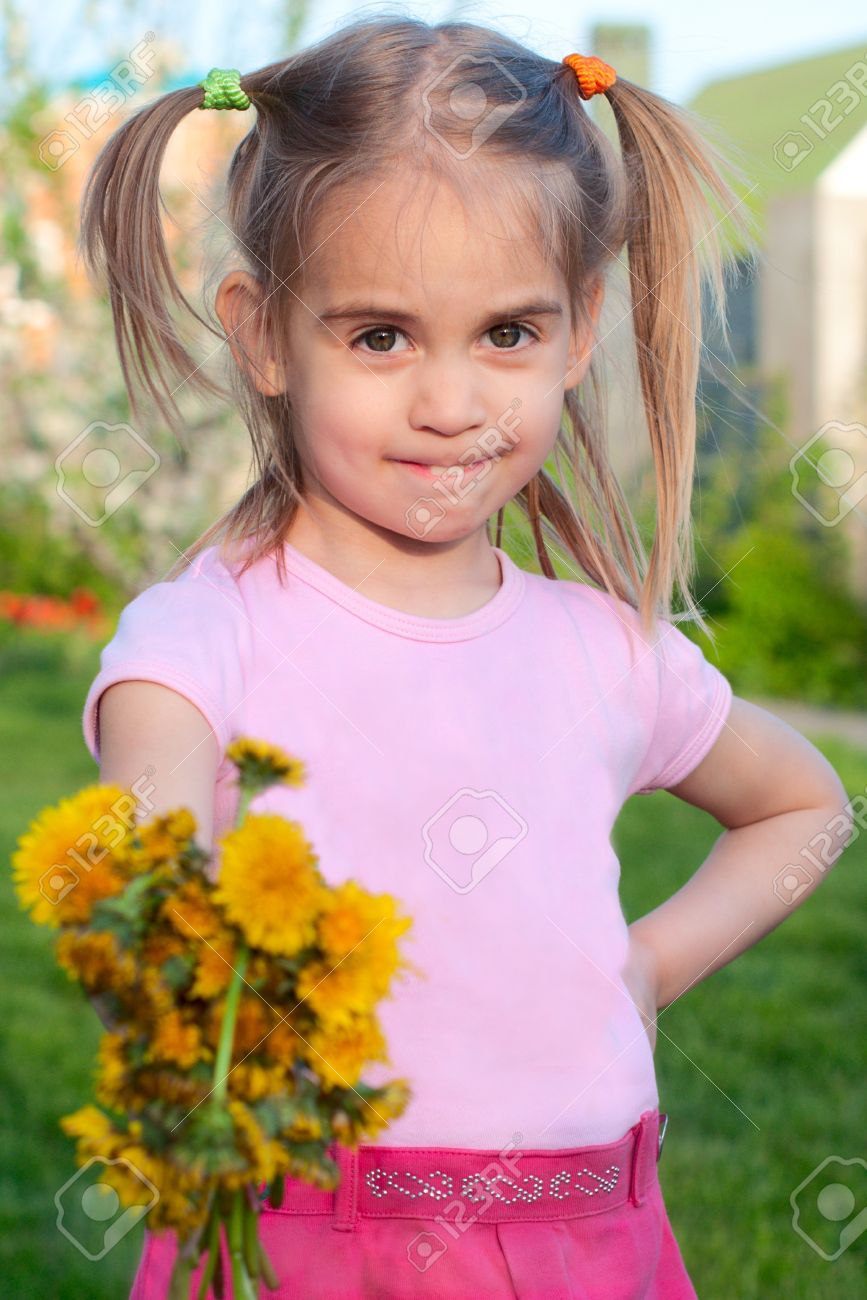 Happy Cute Little Girl Giving Flowers To You Spring Outdoor ...