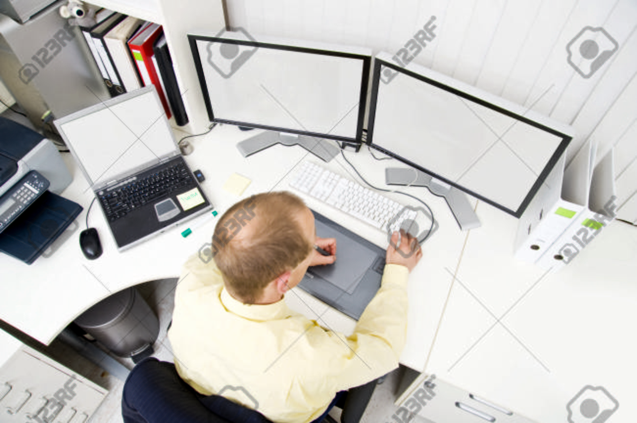 young design engineer using a powerful computer aided design cad workstation