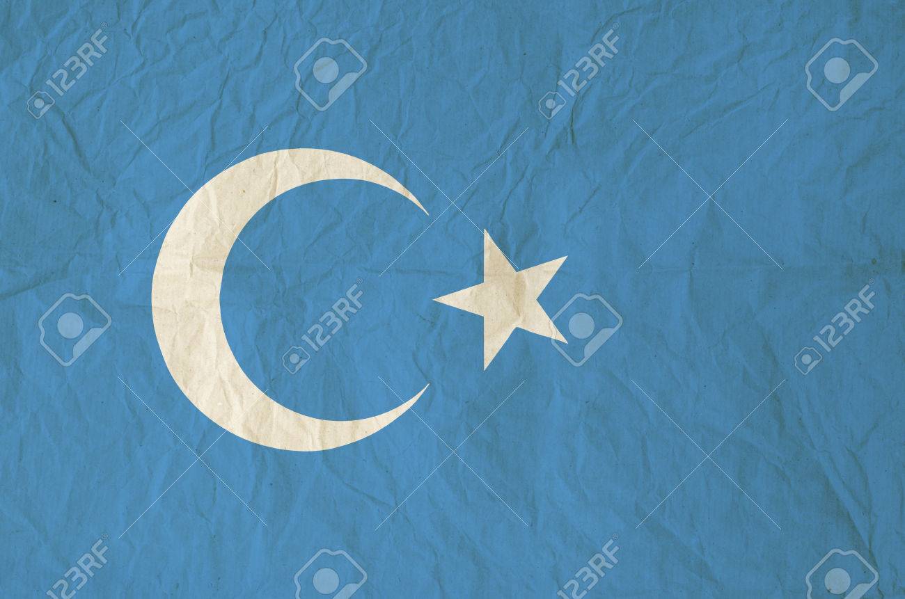 Flag Of Xinjiang Uyghur With Vintage Paper Texture Kokbayraq