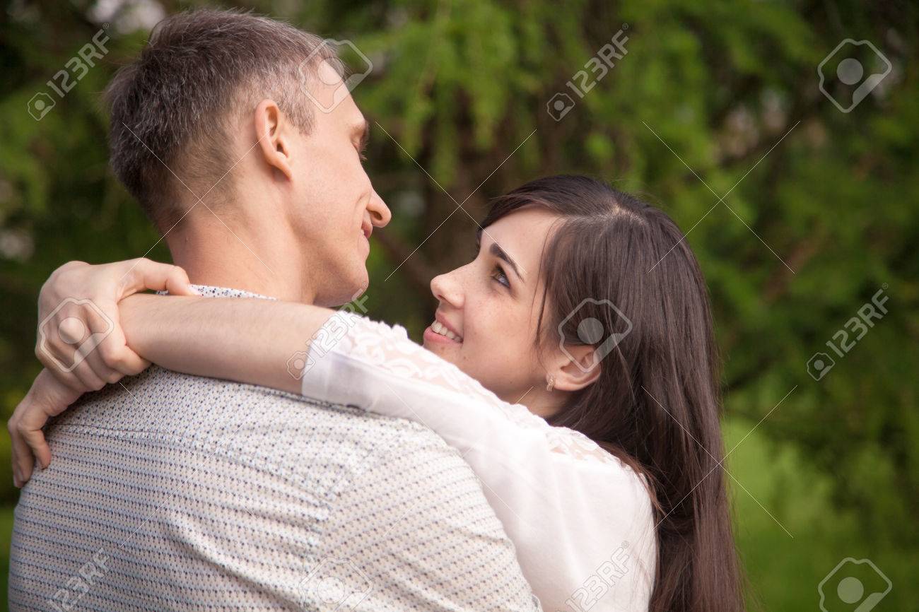 Couple Of Lovers On A Date In Park, Standing Face To Face, Talking,.. Stock Photo, Picture And Royalty Free Image. Image 41618368.