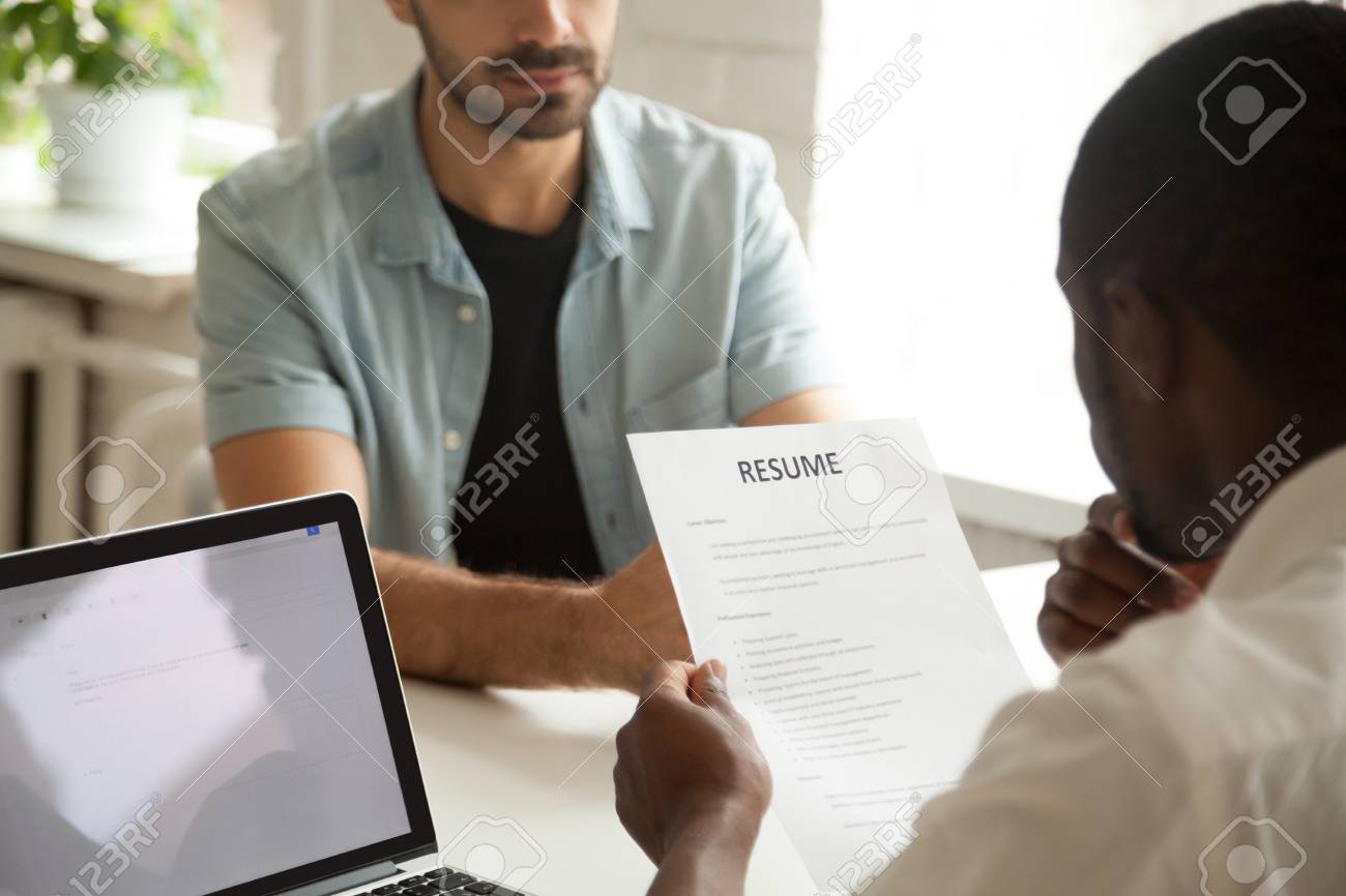 African American Hr Manager Holding Applicants Curriculum Vitae