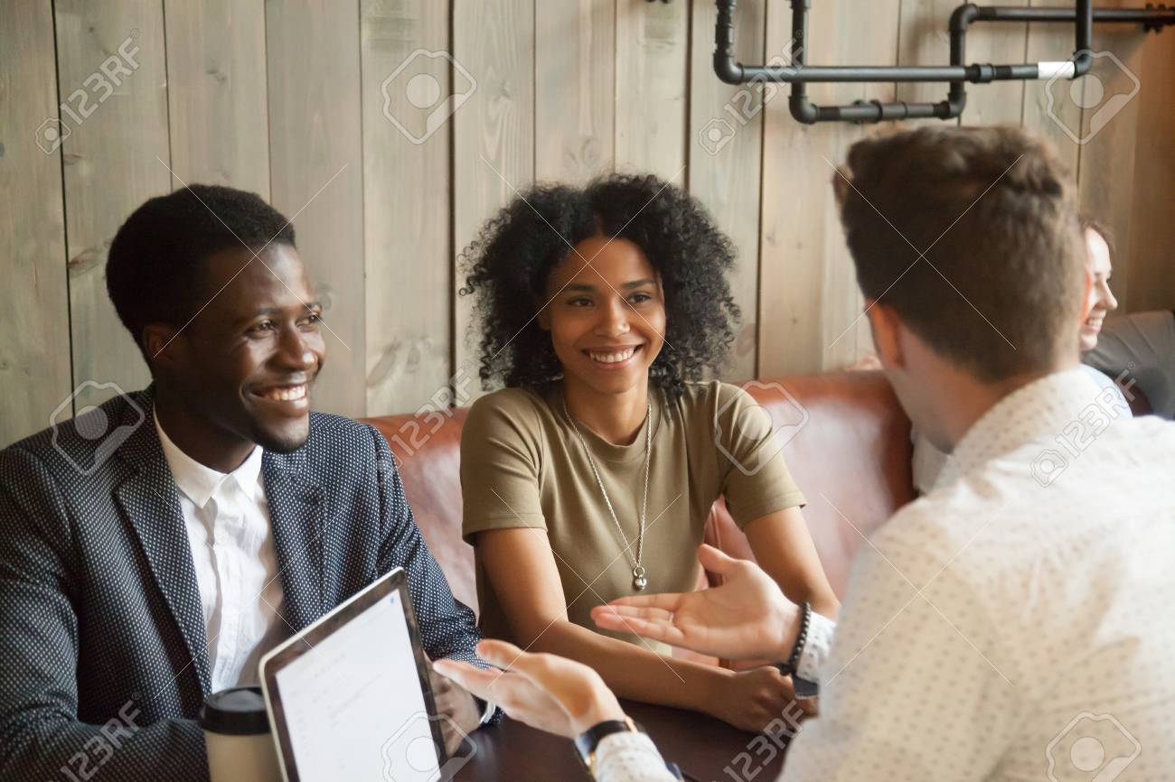 Caucasian Wedding Planner Consulting Black Couple On Marriage