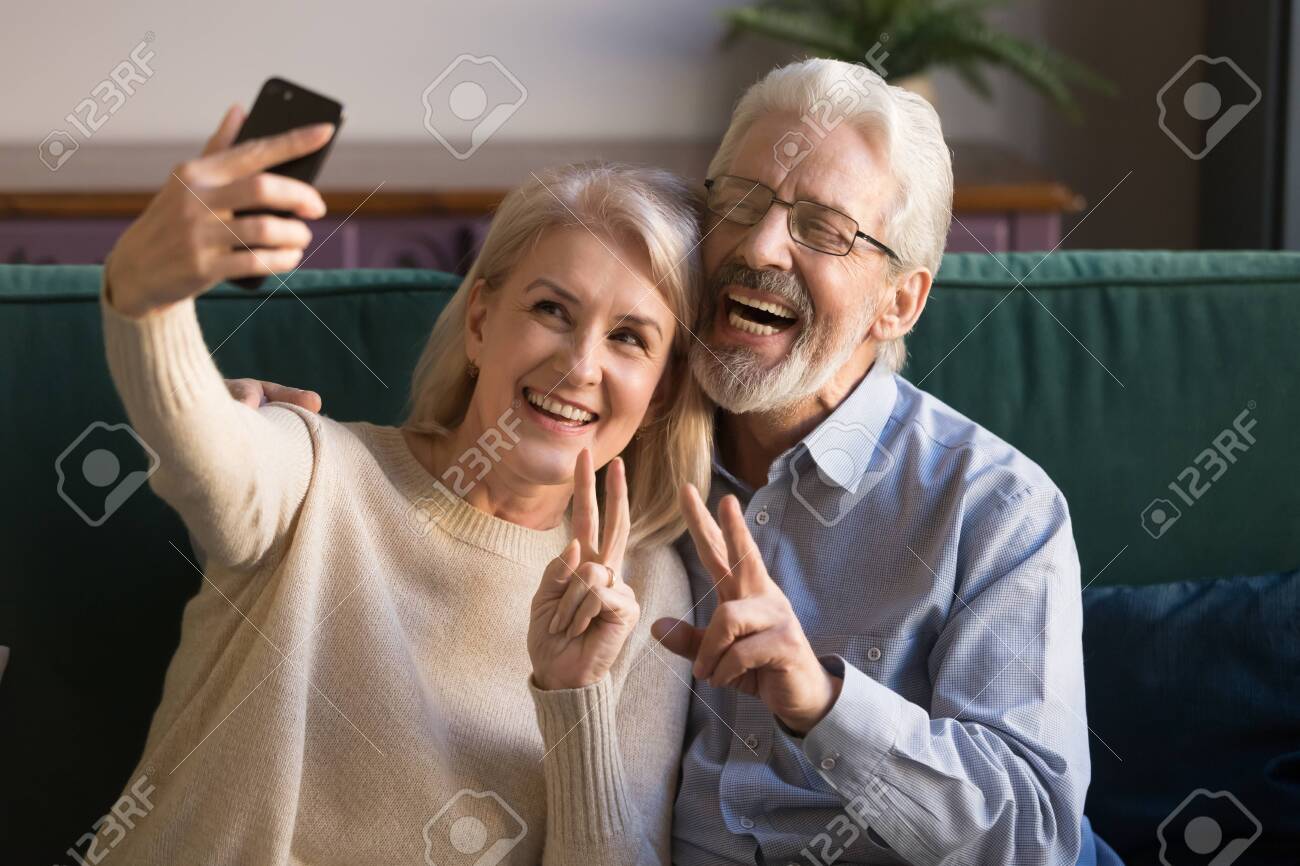 Happy Funny Mature Senior Couple Taking pic
