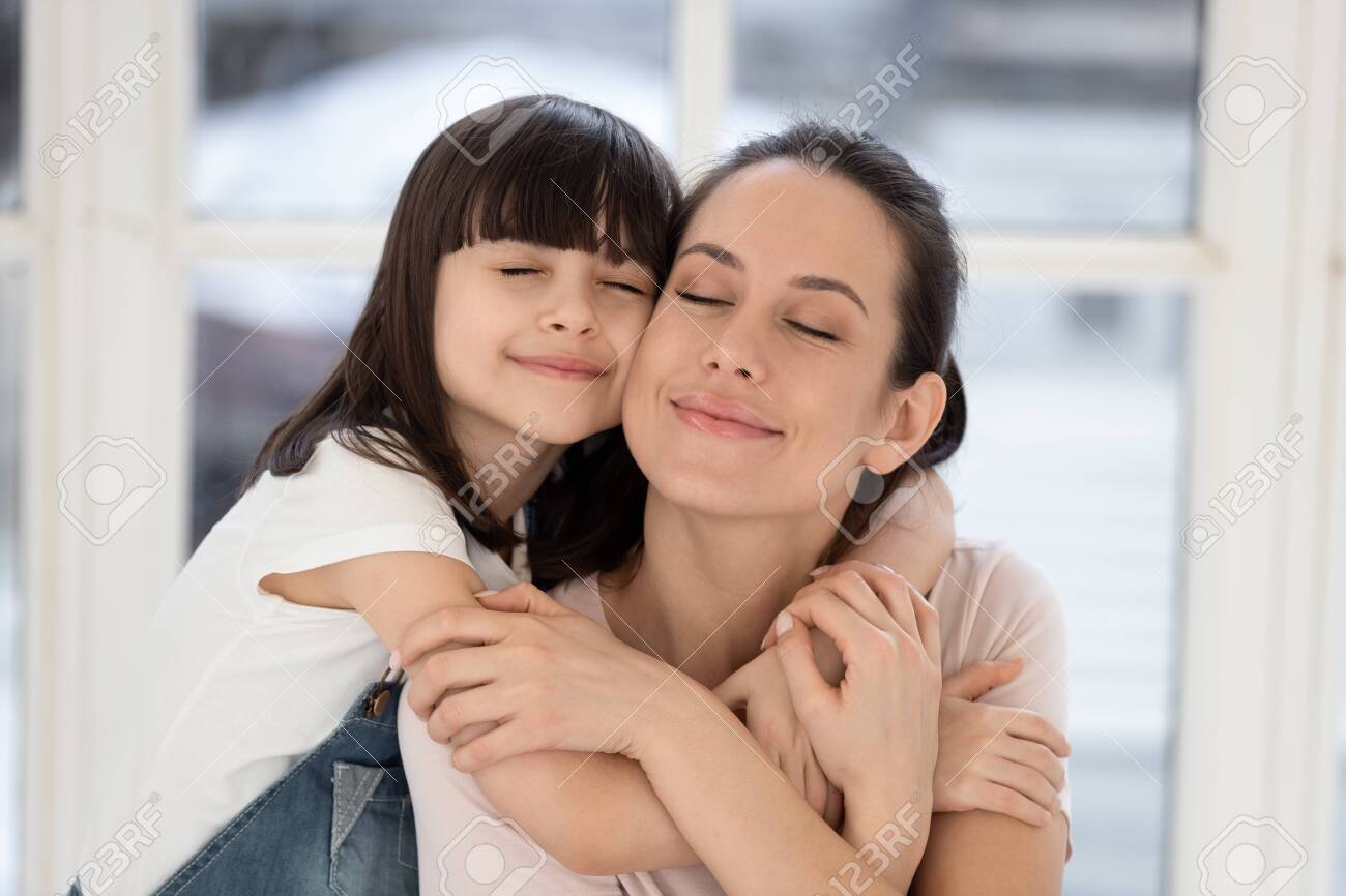 Mother And Daughter Hugging Mother And Daughter Hugging
