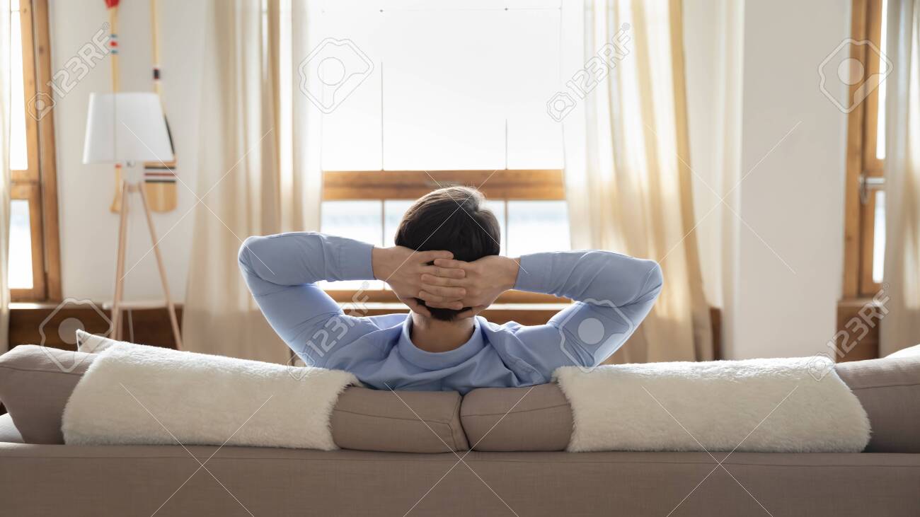 Back View Of Relaxed Caucasian Man Sit Rest On Comfortable Couch Stock Photo Picture And Royalty Free Image Image 148114849