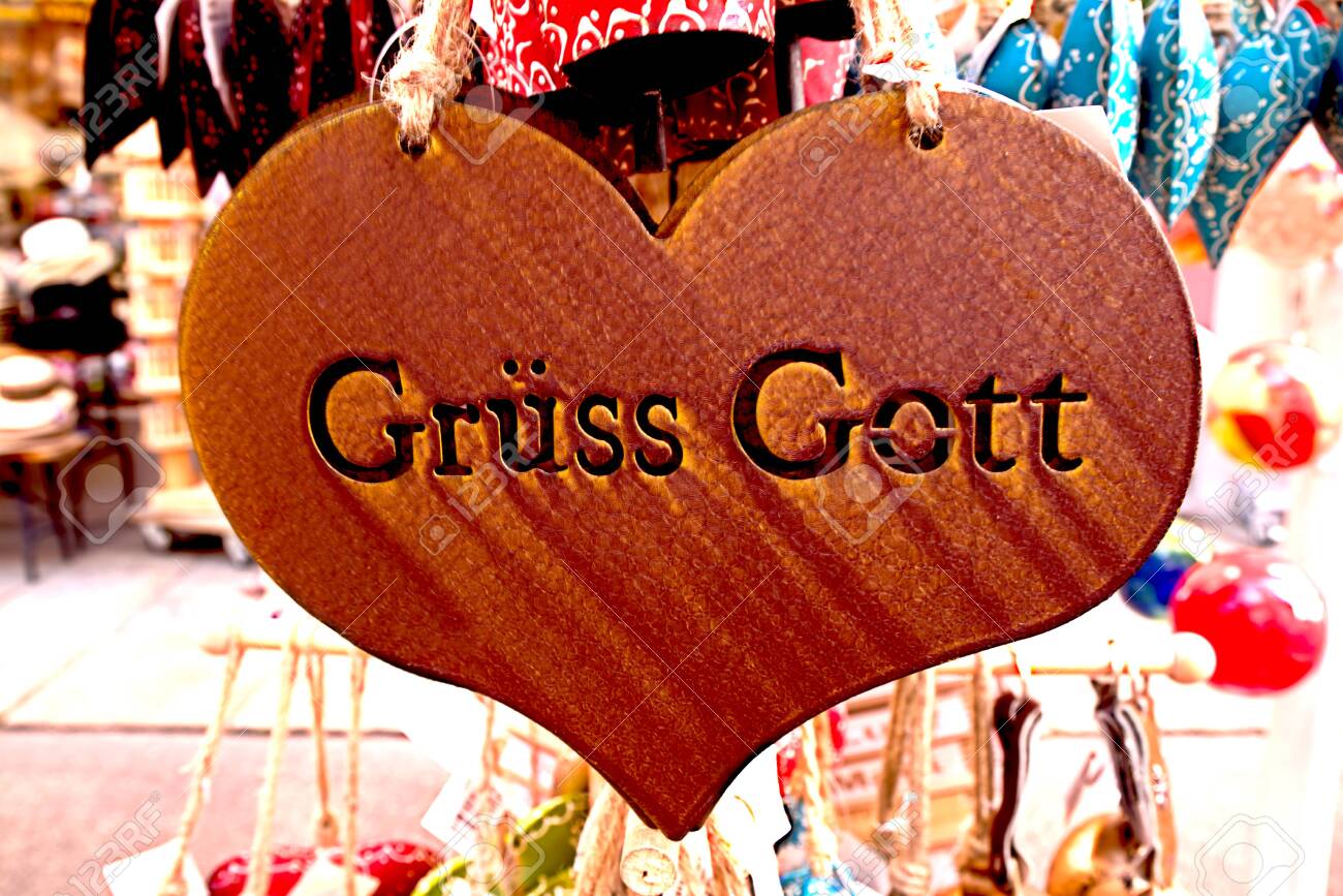 Closeup Of A Felt Heart Souvenir The Typical German Greeting Gruss Got Is Carved