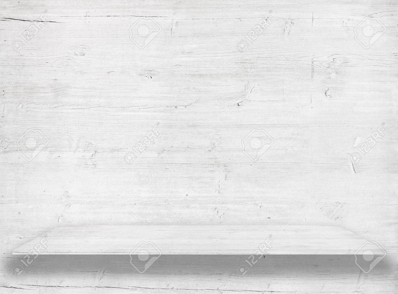 white wood wall with wooden shelf or table surface stock photo