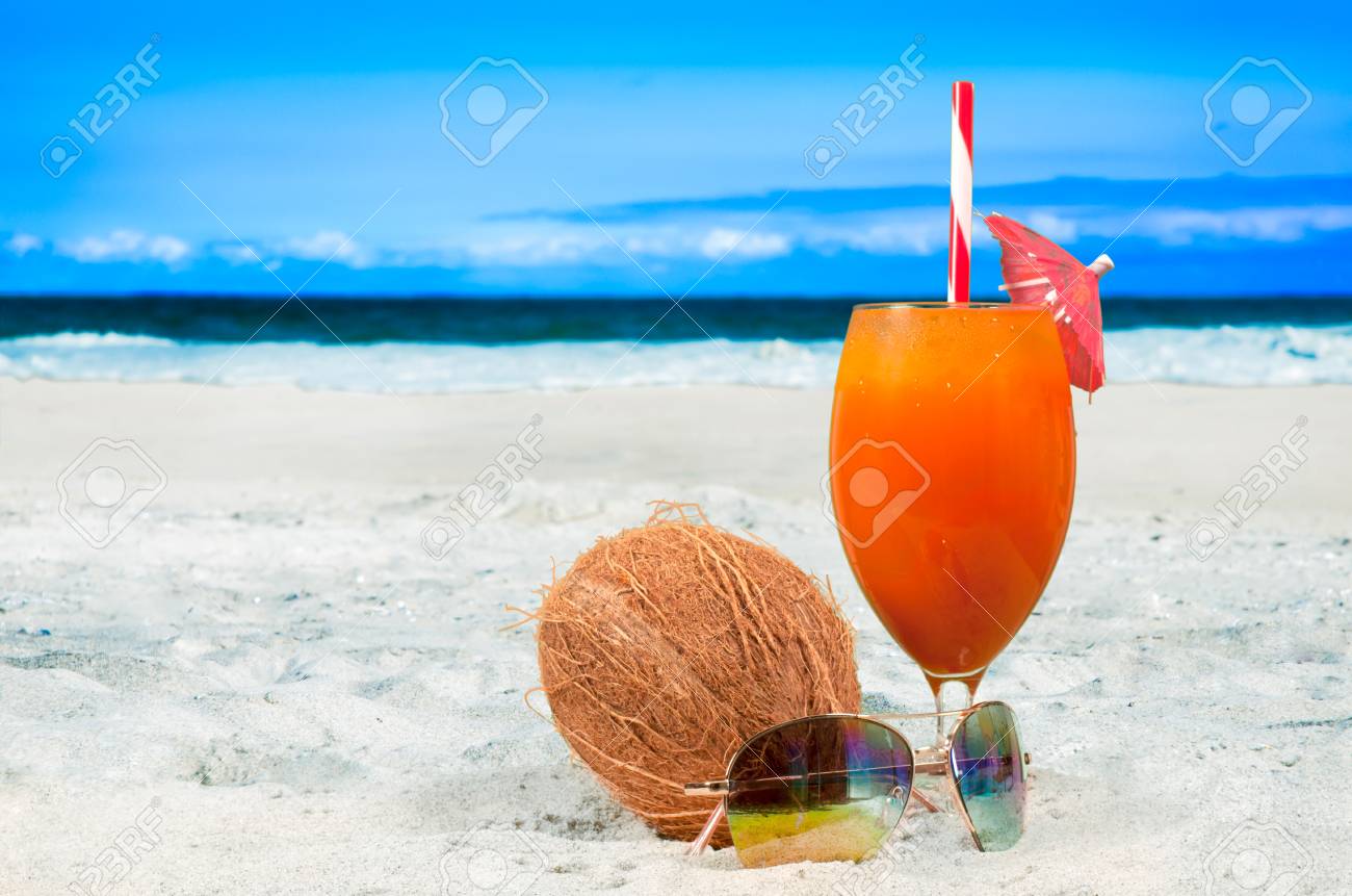 Glass Of Fresh Orange Juice On The Beach Summer Vacation On Stock Photo Picture And Royalty Free Image Image