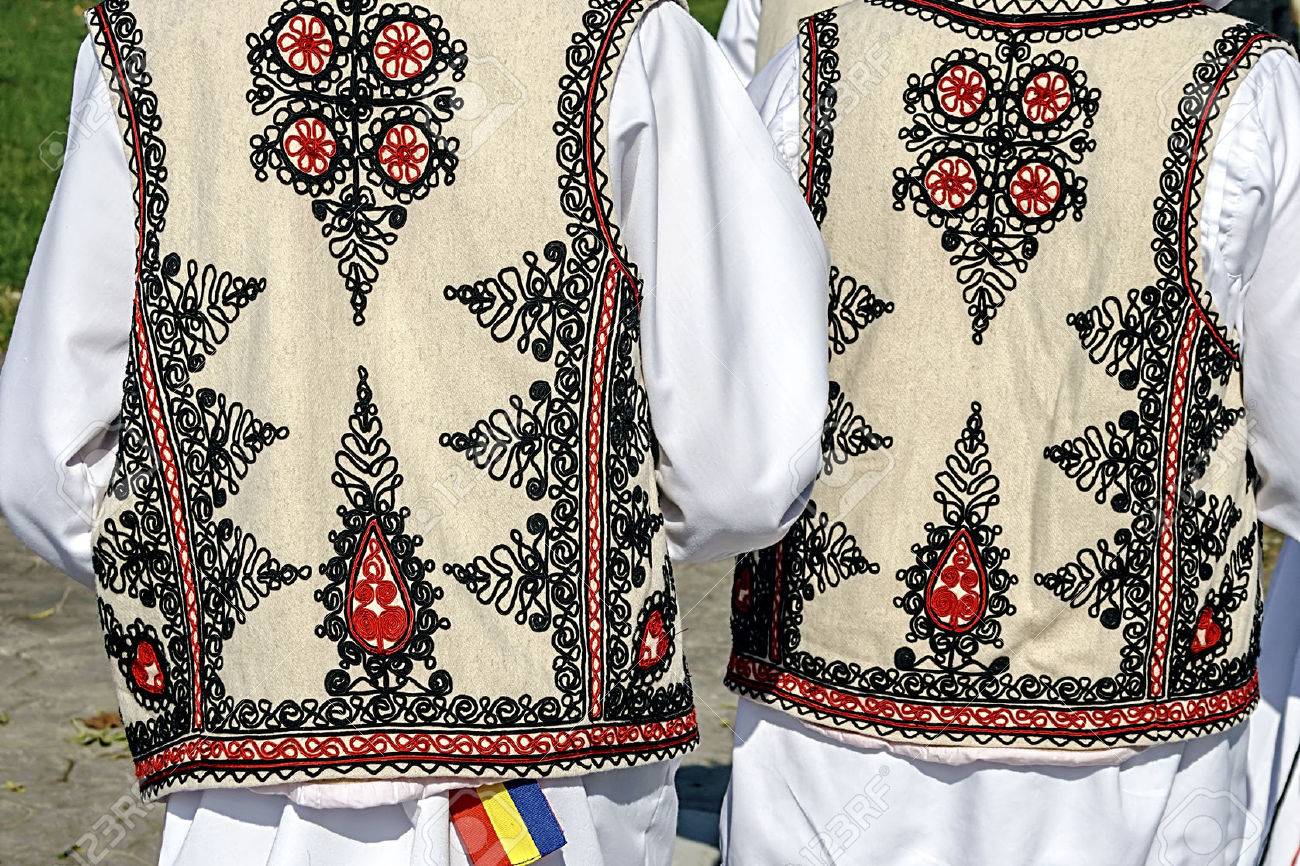 Two people with old traditional Romanian folk costume Specific Banat, Romania - 22980641 Two people with old traditional Romanian folk costume Specific Banat, Romania - 22980641