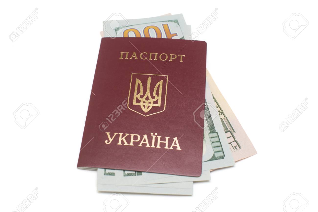 Ukrainian passport and dollars isolated on white background - 95203019 Ukrainian passport and dollars isolated on white background - 95203019