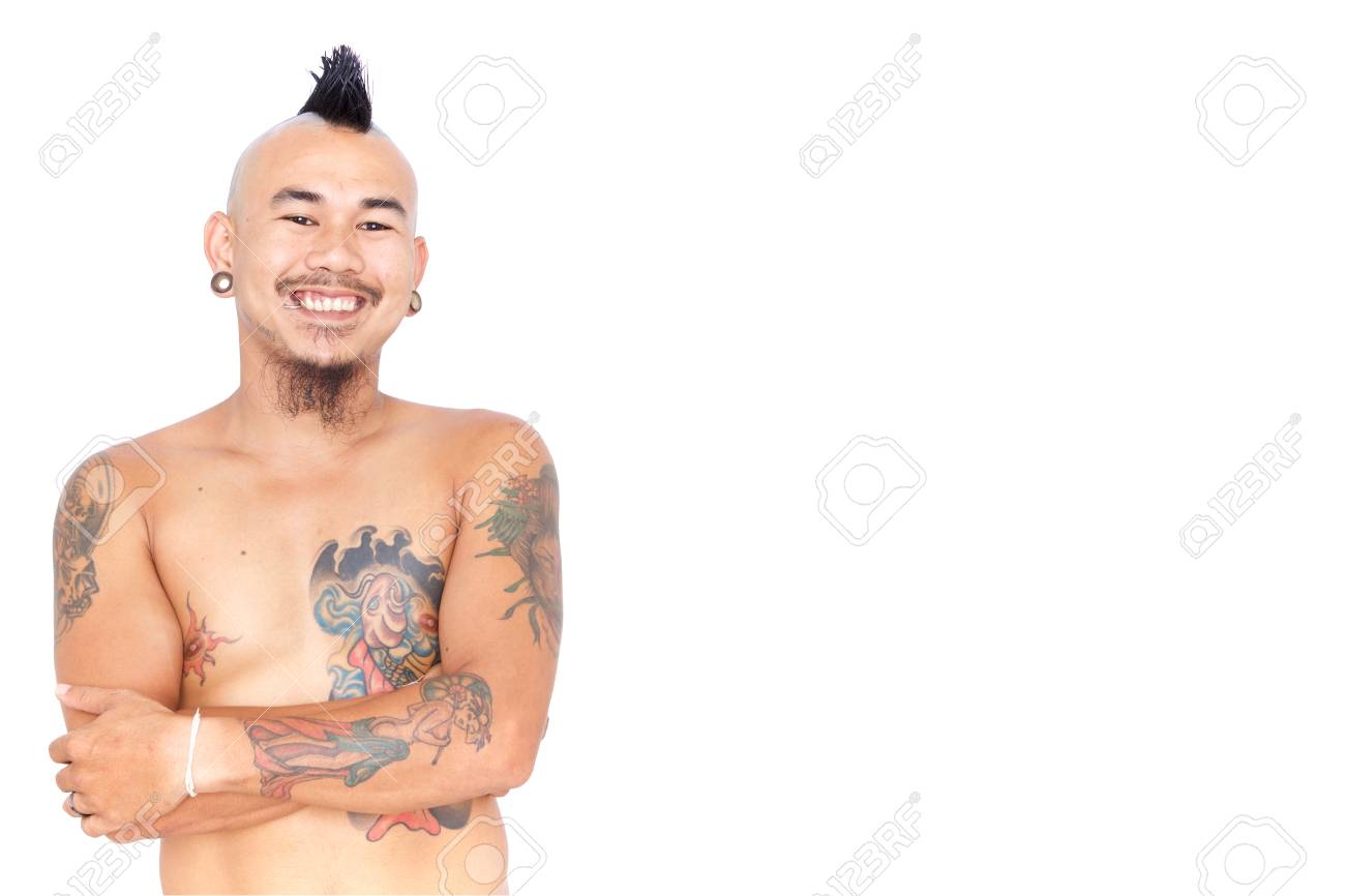 Portrait Of Friendly Asian Punk Guy With Mohawk Hair Style Piercing