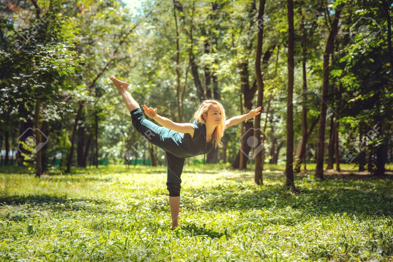 Virabhadrasana III. Yoga asanas in nature. Yoga poses everyday Virabhadrasana III. Yoga asanas in nature. Yoga poses everyday
