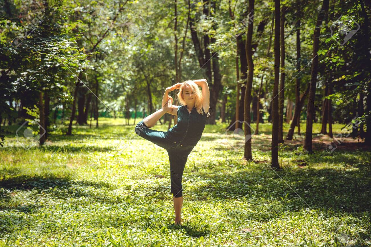 Natarajasana. Yoga asanas in nature. Yoga poses everyday. Practicing.. Natarajasana. Yoga asanas in nature. Yoga poses everyday. Practicing..
