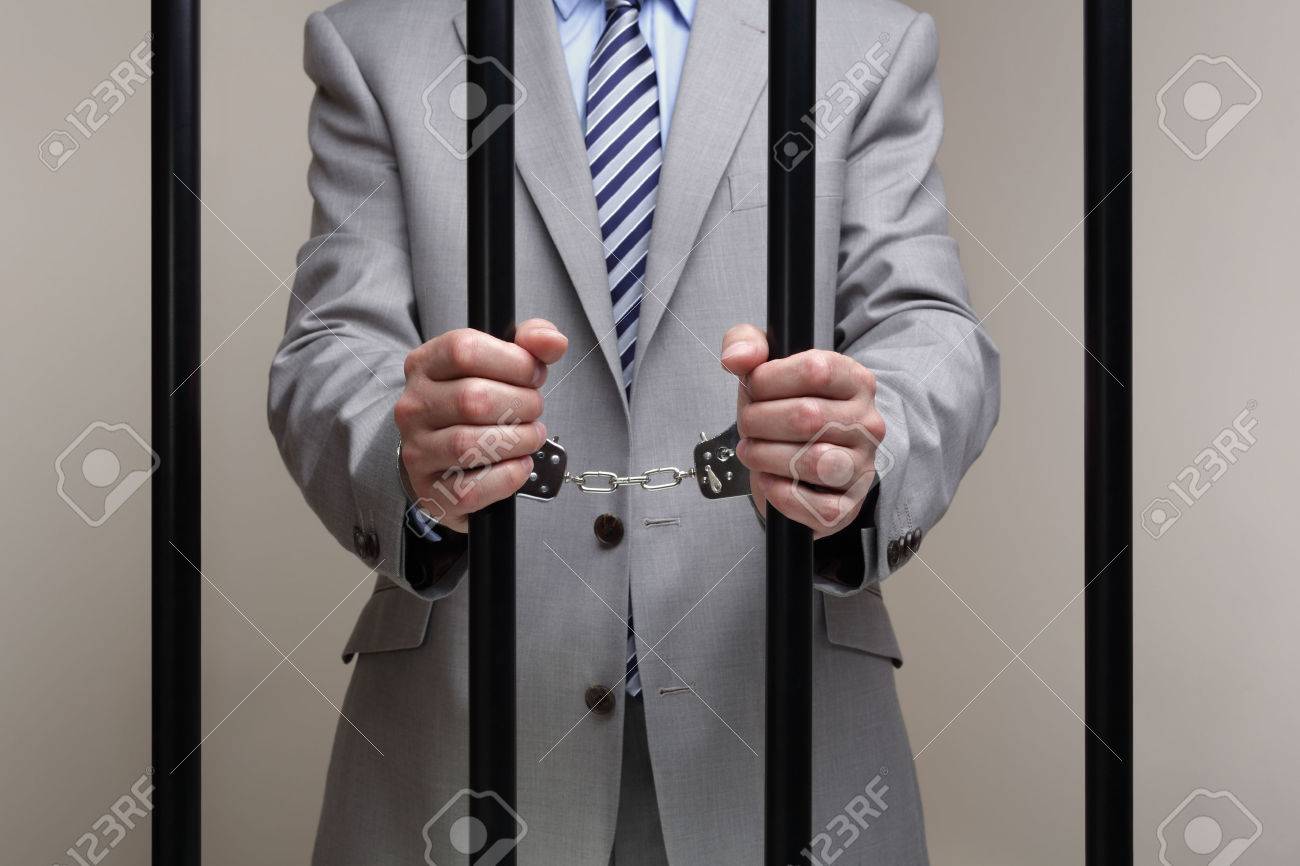 ホワイト カラー犯罪のための刑務所の概念でバーの後ろに実業家 の写真素材 画像素材 Image