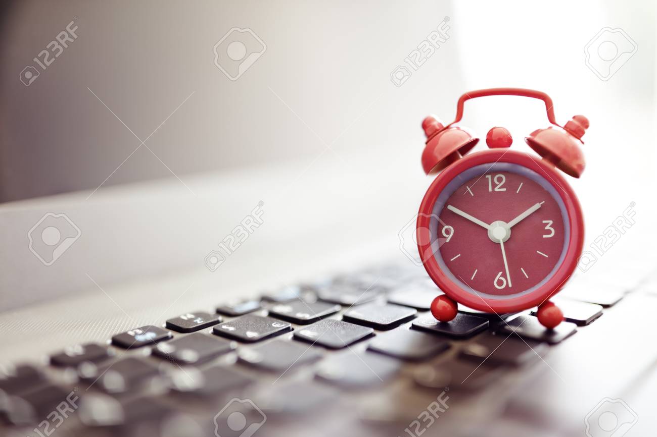 Alarm clock on laptop concept for business deadline, schedule and urgency - 59291500 Alarm clock on laptop concept for business deadline, schedule and urgency - 59291500