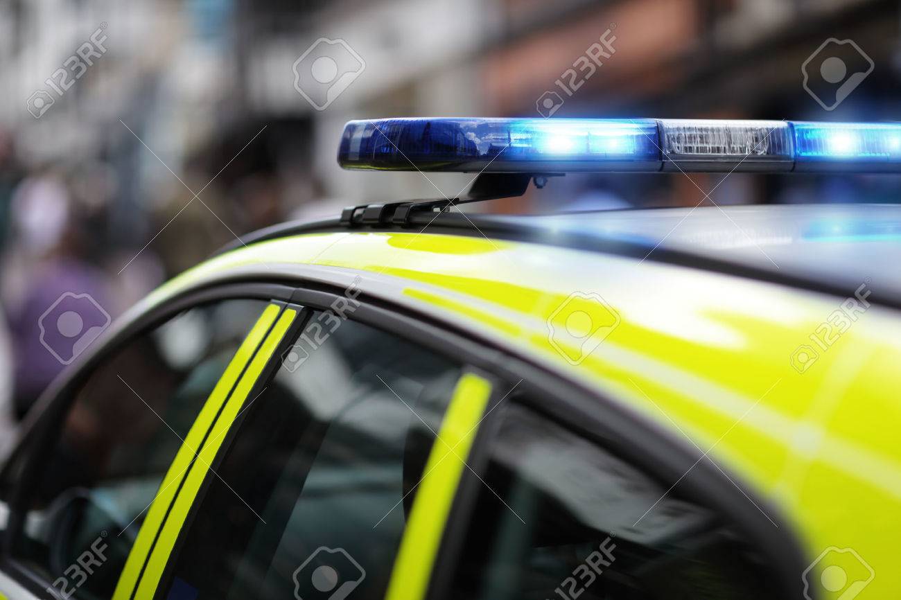 Police siren flashing blue lights at accident or crime scene - 59291502 Police siren flashing blue lights at accident or crime scene - 59291502