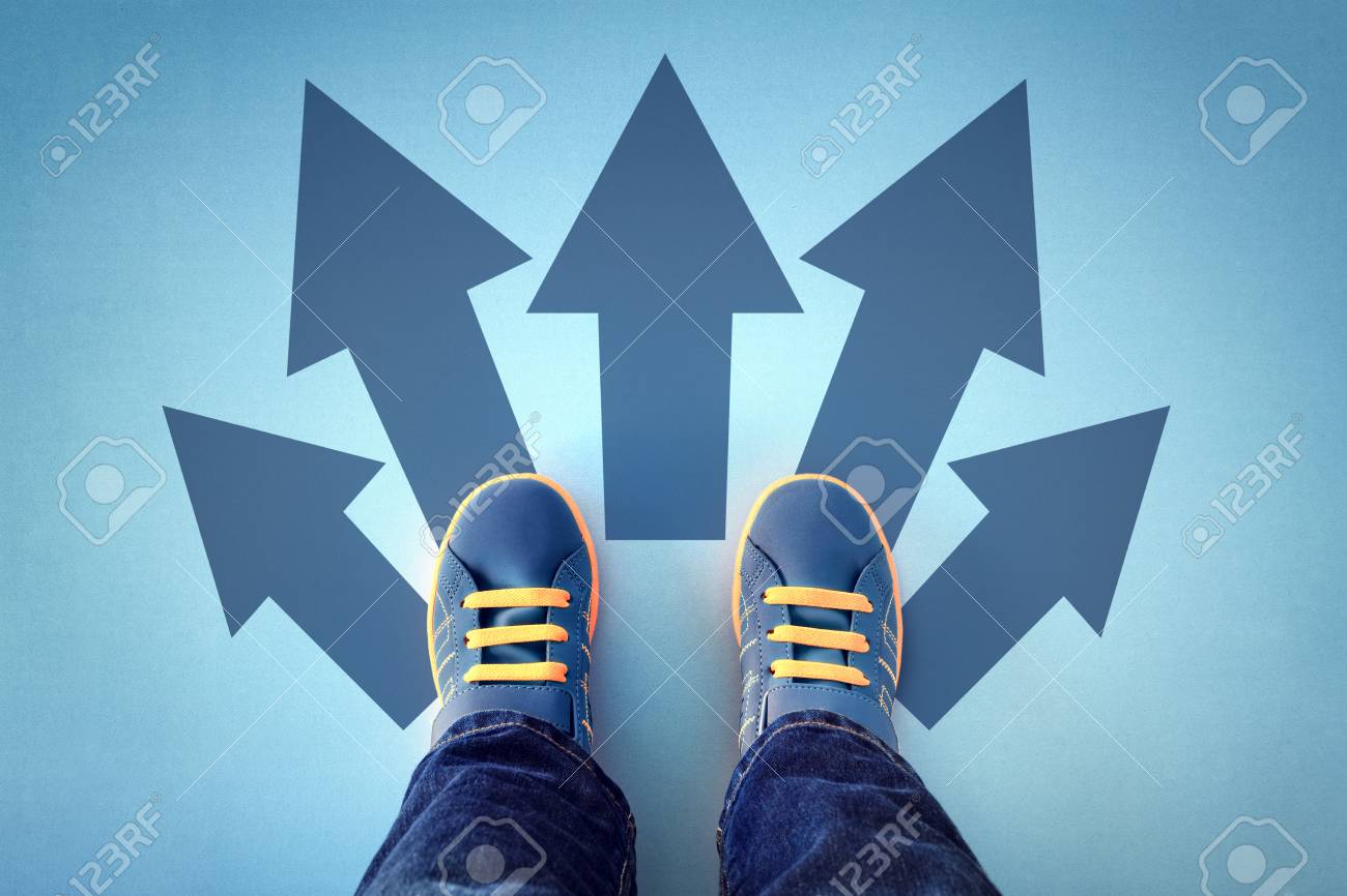 Taking decisions for the future child standing with many direction arrow choices, left, right or move forward - 80036016 Taking decisions for the future child standing with many direction arrow choices, left, right or move forward - 80036016