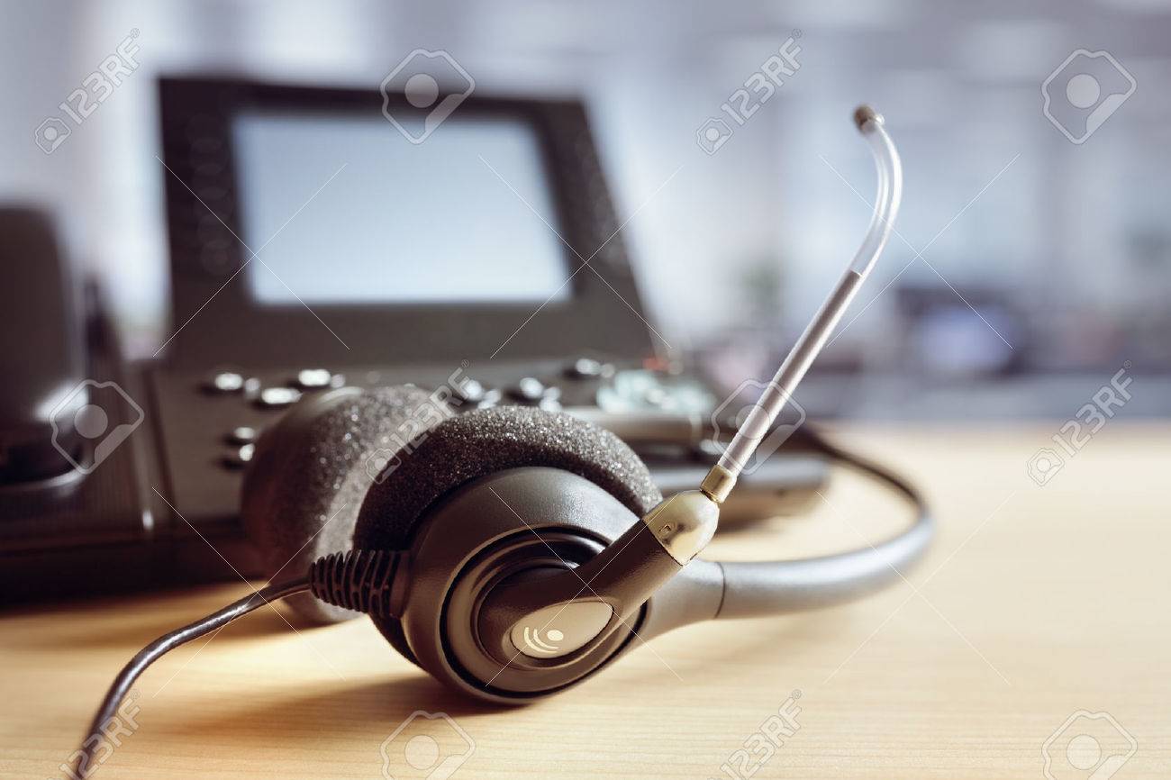VOIP headset headphones and telephone concept for communication, it support, call center and customer service help desk - 80025324 VOIP headset headphones and telephone concept for communication, it support, call center and customer service help desk - 80025324