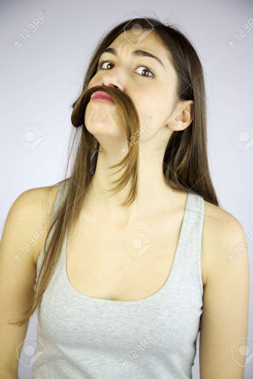 Funny Girl Making Mustache With Her Very Long Hair Stock Photo, Picture And  Royalty Free Image. Image 13133621.