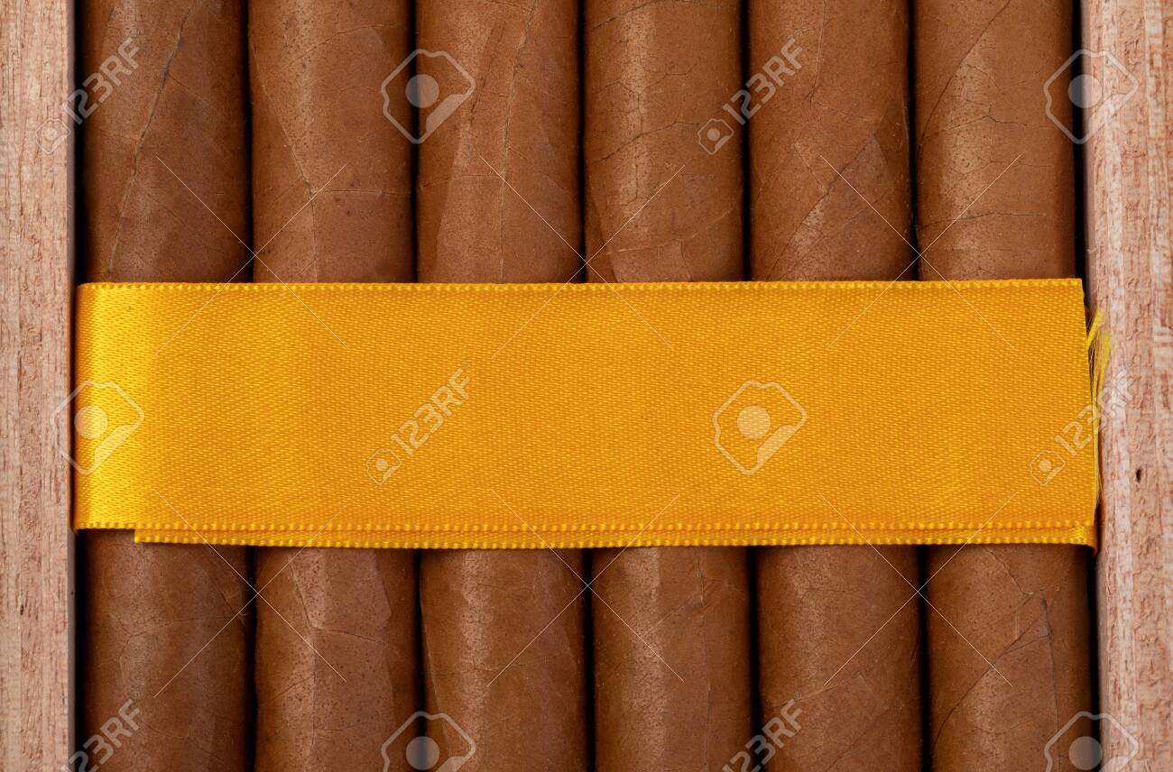 Download Packing Of Cuban Cigars In A Box With A Yellow Ribbon Mockup Stock Photo Picture And Royalty Free Image Image 118727875