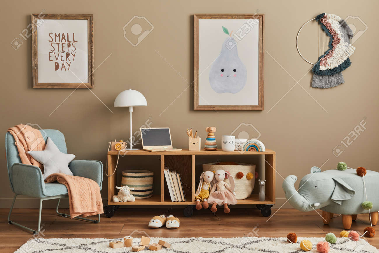 Stylish scandinavian kid room interior with toys, teddy bear, plush animal toys, mint armchair, furniture, decoration and child accessories. Brown wooden mock up poster frames on the wall. Template - 168356616 Stylish scandinavian kid room interior with toys, teddy bear, plush animal toys, mint armchair, furniture, decoration and child accessories. Brown wooden mock up poster frames on the wall. Template - 168356616
