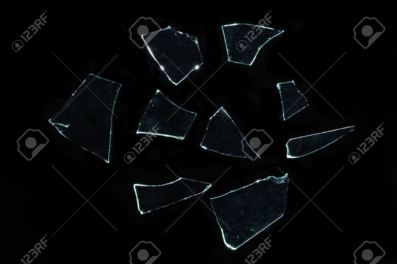 Broken Glass With Sharp Pieces Over Black Stock Photo, Picture and