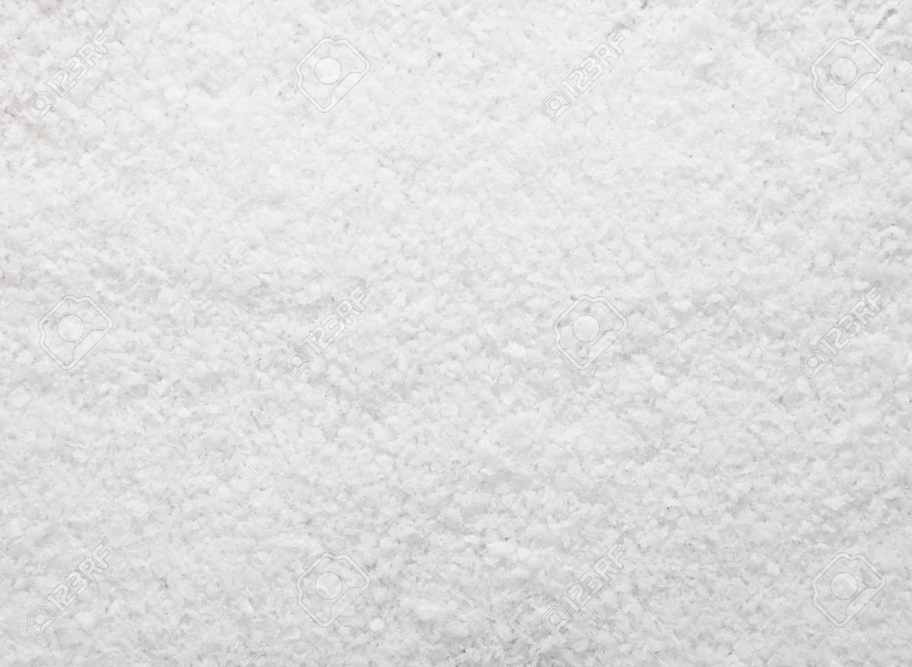 Winter Snow Background Of Pristine White Snow With An Even Textured Surface  As Copyspace For Your Text Stock Photo, Picture And Royalty Free Image.  Image 15145557.