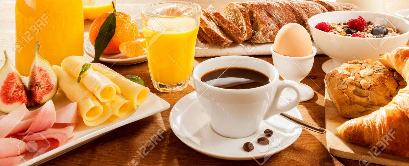 Full breakfast with figs, egg, meat, bread, coffee and juice - 51721208 Full breakfast with figs, egg, meat, bread, coffee and juice - 51721208