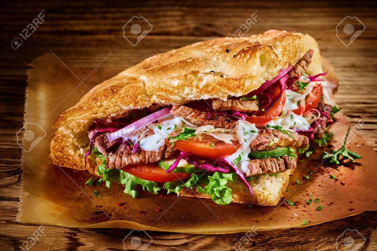 tasty traditional turkish doner kebab with shaved roasted meat