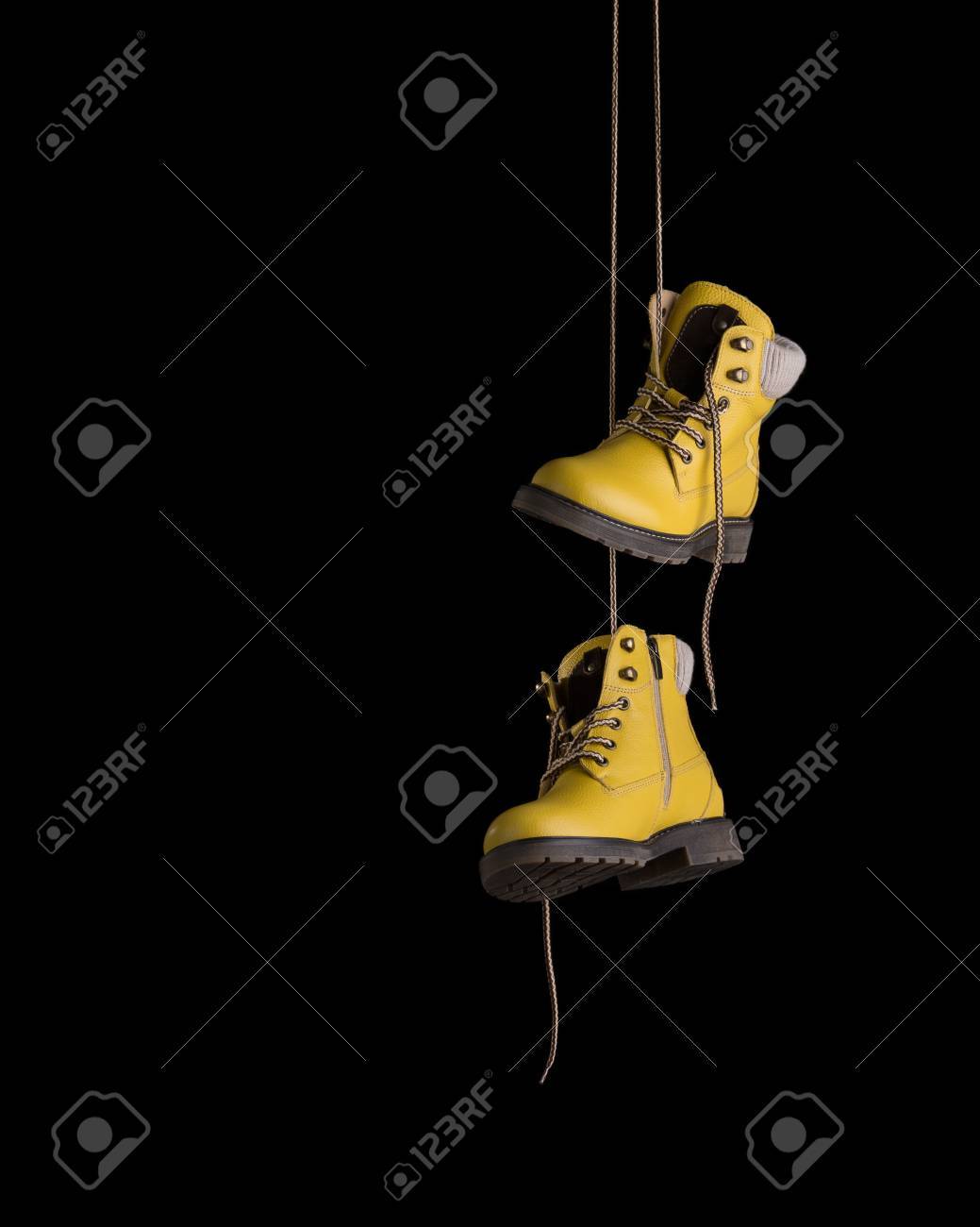 black timbs with yellow laces