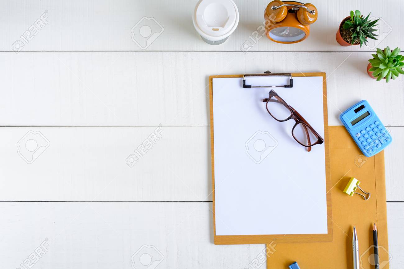 Flat Lay Office Equipment On A White Wood Desk With A Business Stock Photo Picture And Royalty Free Image Image 83318492