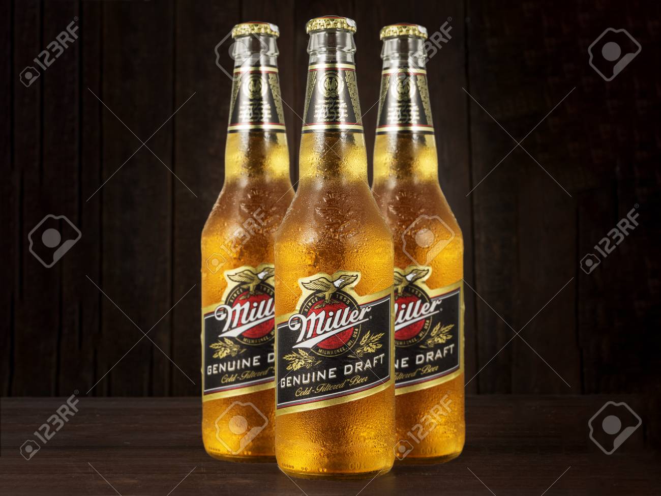 Miller Genue Draft Beer Bottles On Dark Wooden Background Stock Photo Picture And Royalty Free Image Image 81983378