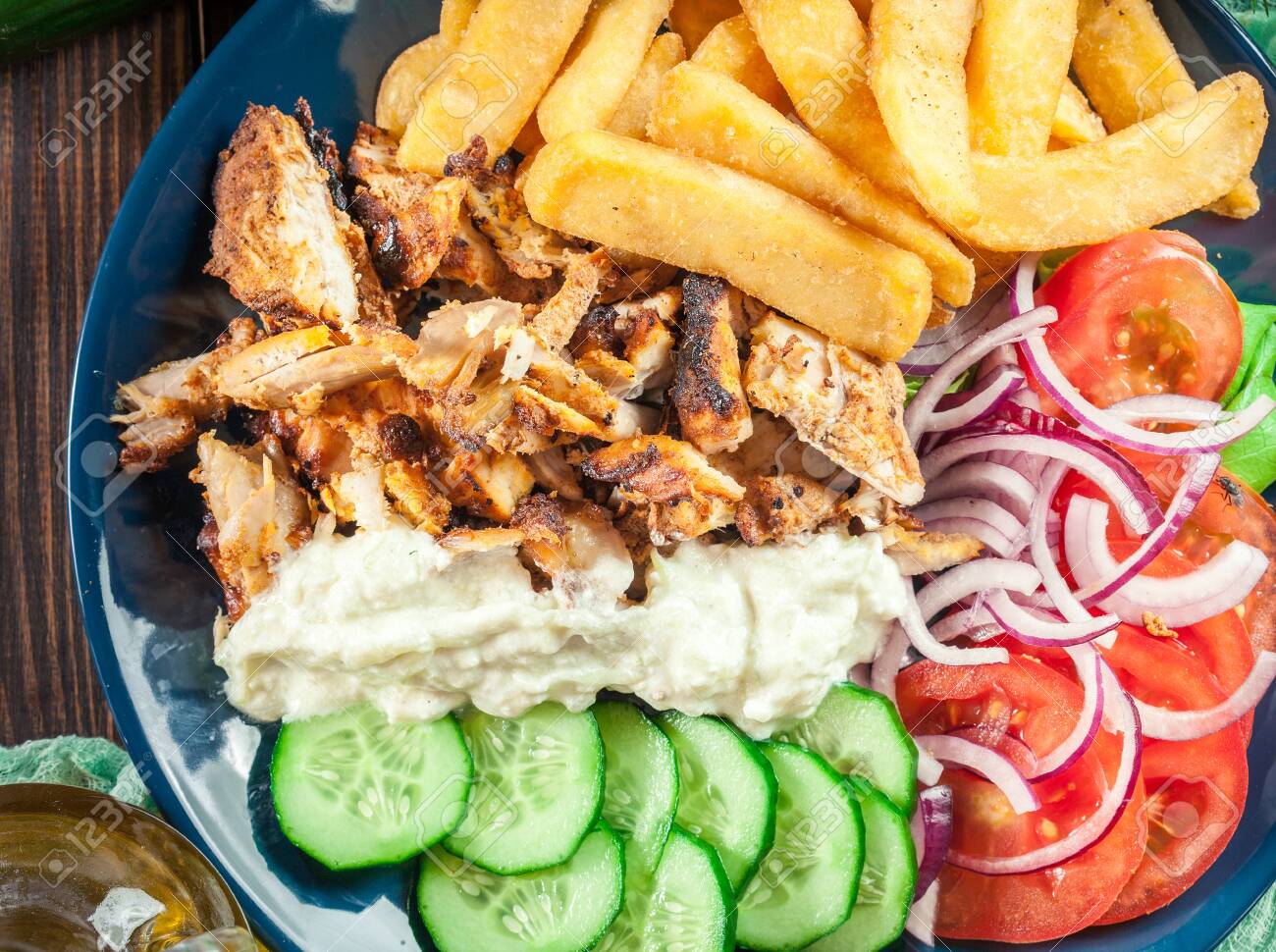 Greek Gyros Dish With French Fries And Vegetables Served With Stock Photo Picture And Royalty Free Image Image 121914801