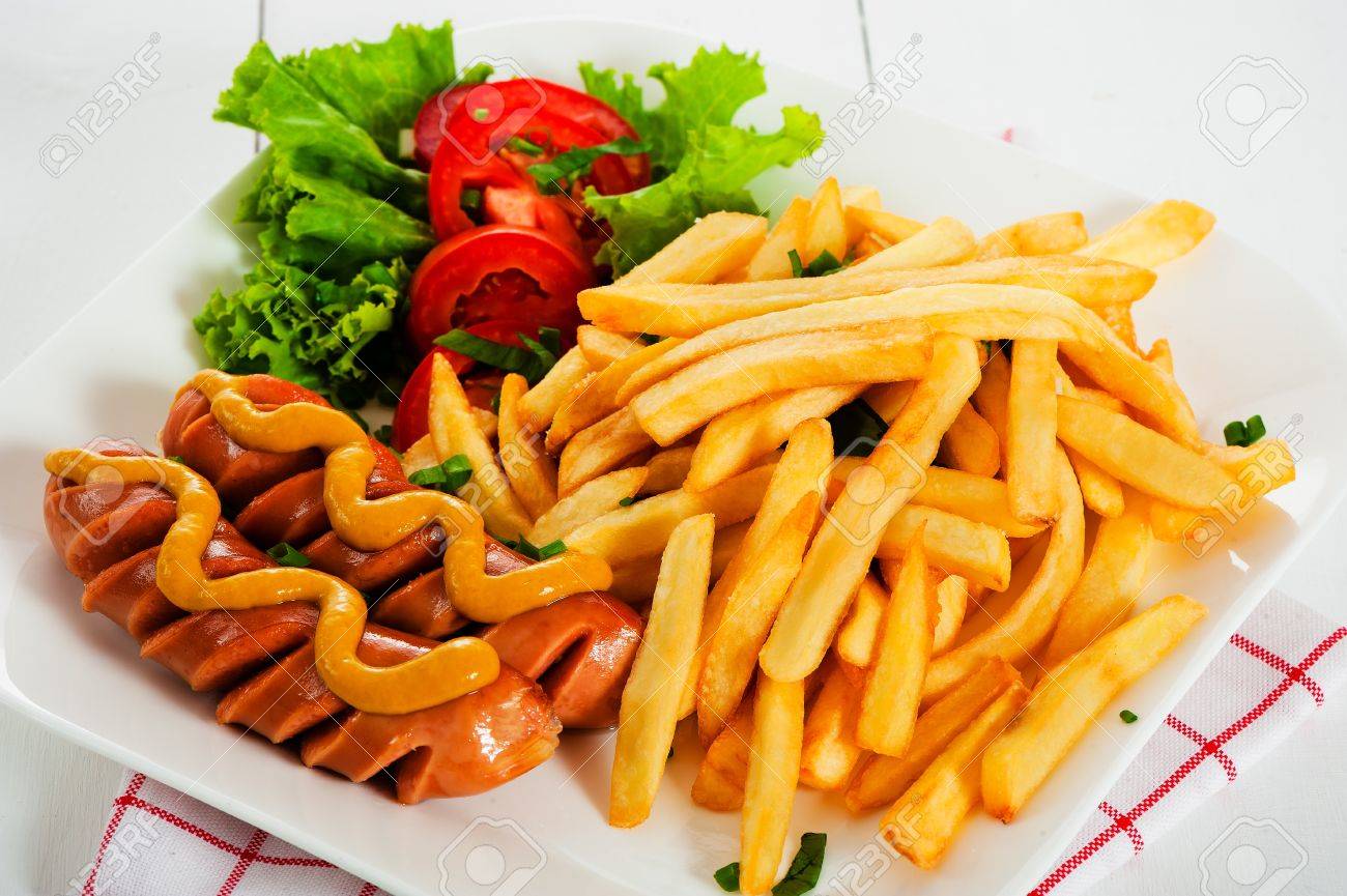 Potatoes fries with sausage mustard and tomato salad - 15096400 Potatoes fries with sausage mustard and tomato salad - 15096400