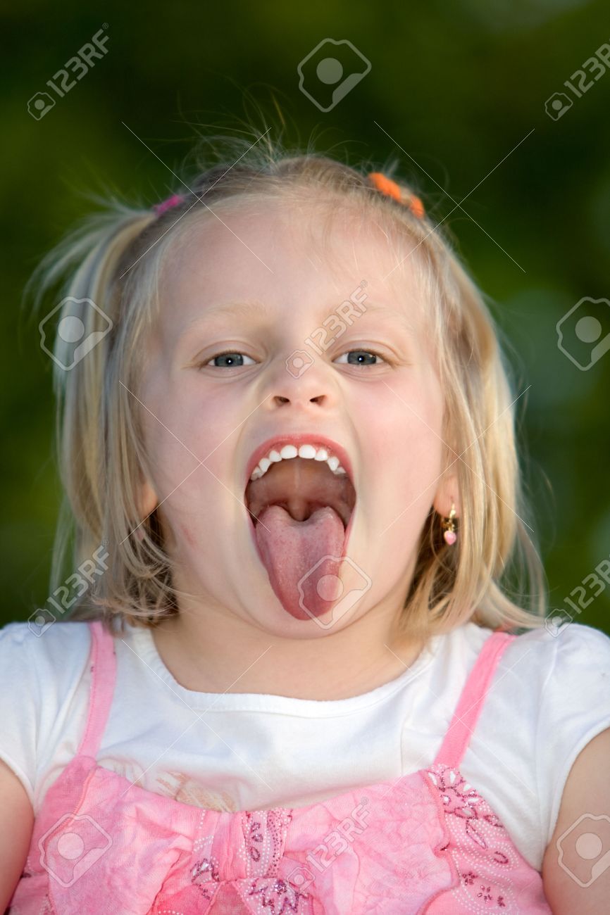young girl tongue out Young Child To Stick Her Tongue Out Stock Photo, Picture and Royalty Free  Image. Image 5209339.