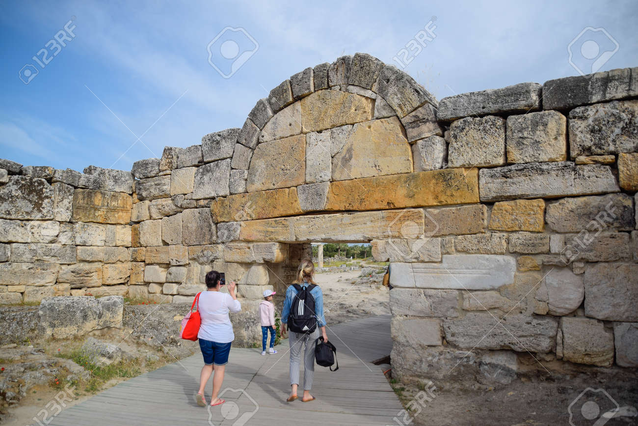 Hierapolis, Turkey - May 22, 2019: The walls of the ancient ruins of limestone blocks. Ruins of the city of Hierapolis, Turkey. - 133523033 Hierapolis, Turkey - May 22, 2019: The walls of the ancient ruins of limestone blocks. Ruins of the city of Hierapolis, Turkey. - 133523033