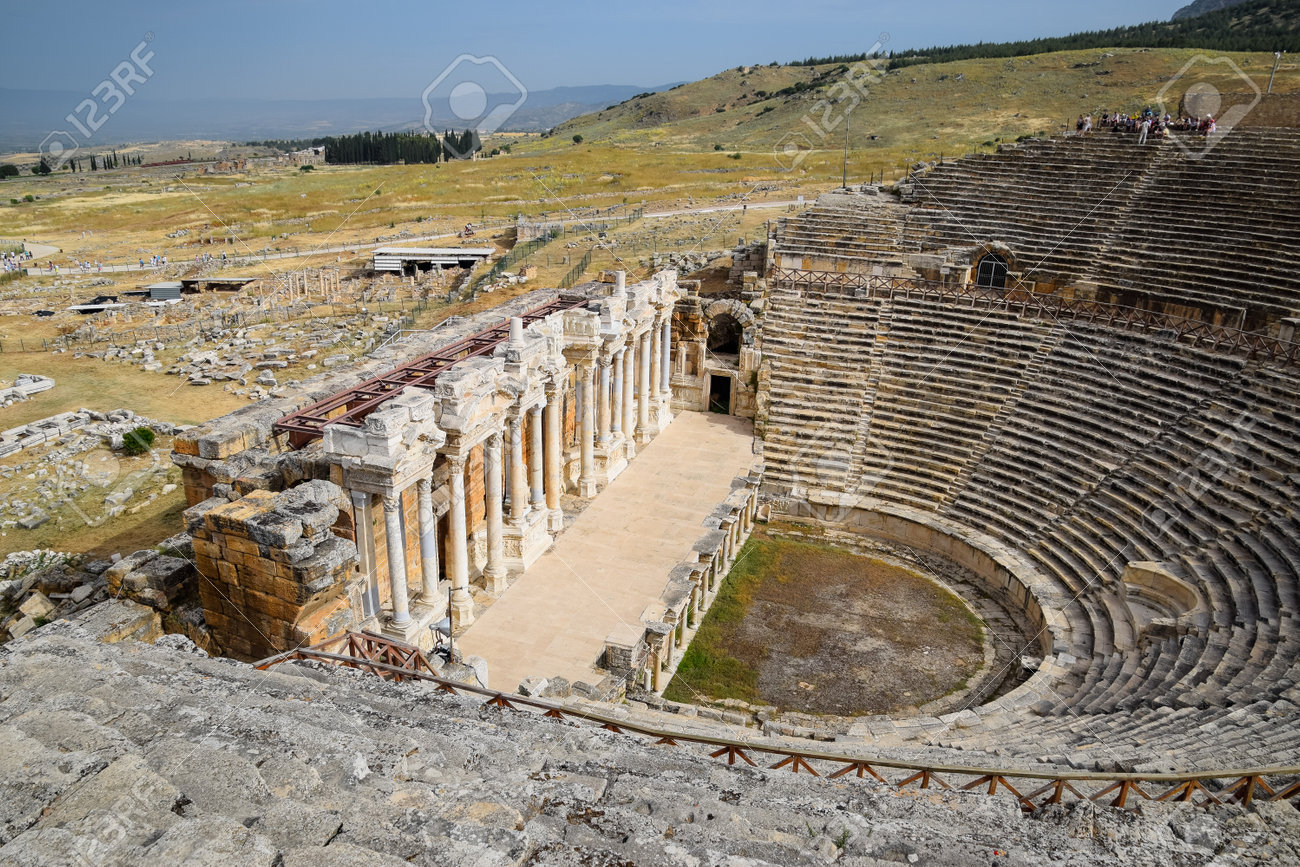 Pamukkale, Hierapolis, Turkey - May 22, 2019: Ancient antique amphitheater in the city of Hierapolis in Turkey. Steps and antique statues with columns in the amphitheater - 133523219 Pamukkale, Hierapolis, Turkey - May 22, 2019: Ancient antique amphitheater in the city of Hierapolis in Turkey. Steps and antique statues with columns in the amphitheater - 133523219