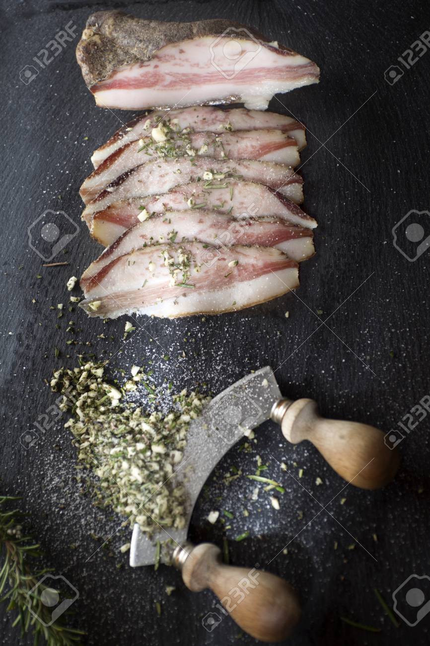 presentation of salted pork bacon on stone slate stock photo slate presentation