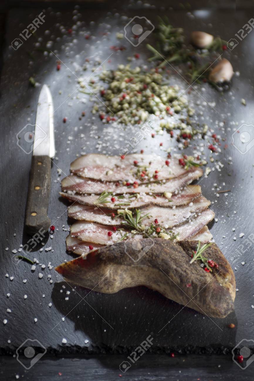 presentation of salted pork bacon on stone slate stock photo slate presentation