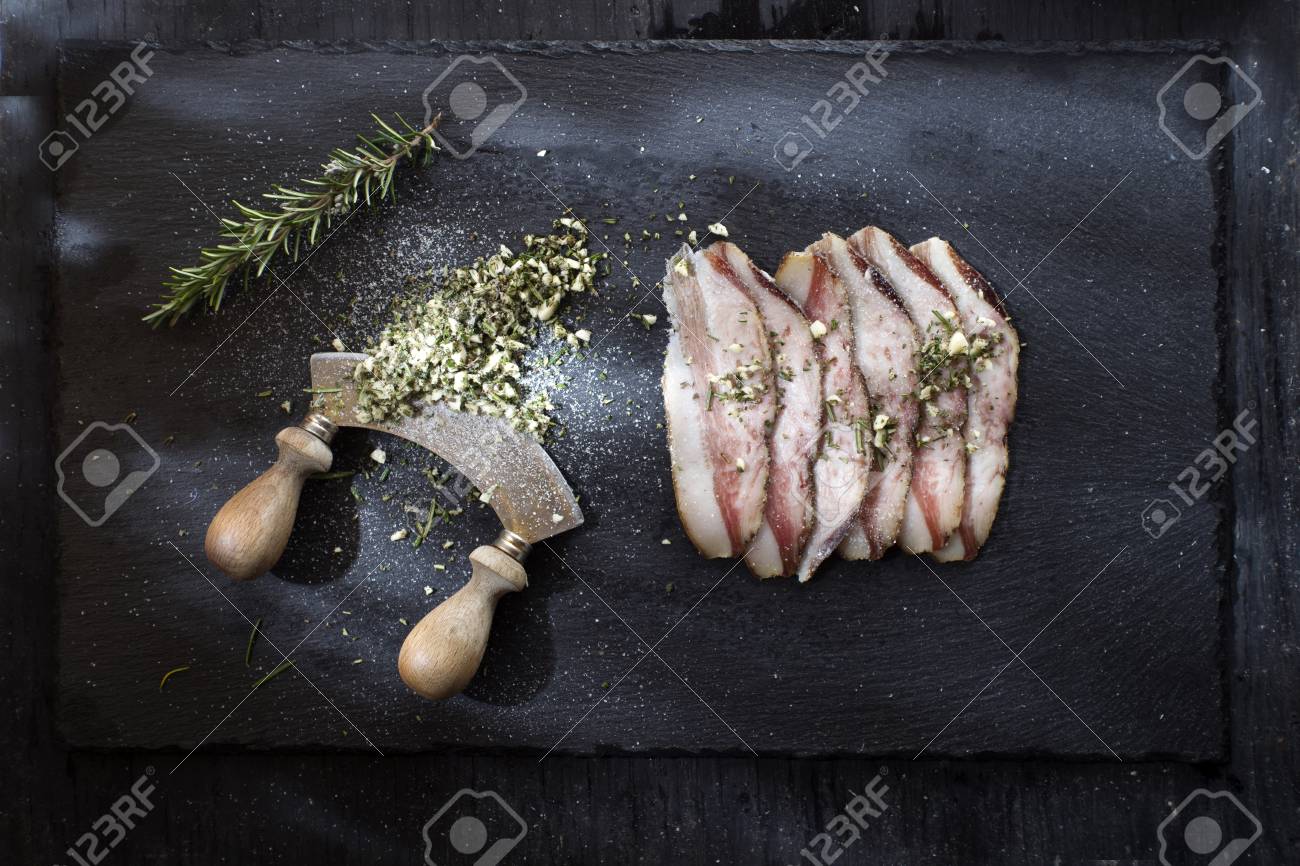 presentation of salted pork bacon on stone slate stock photo slate presentation