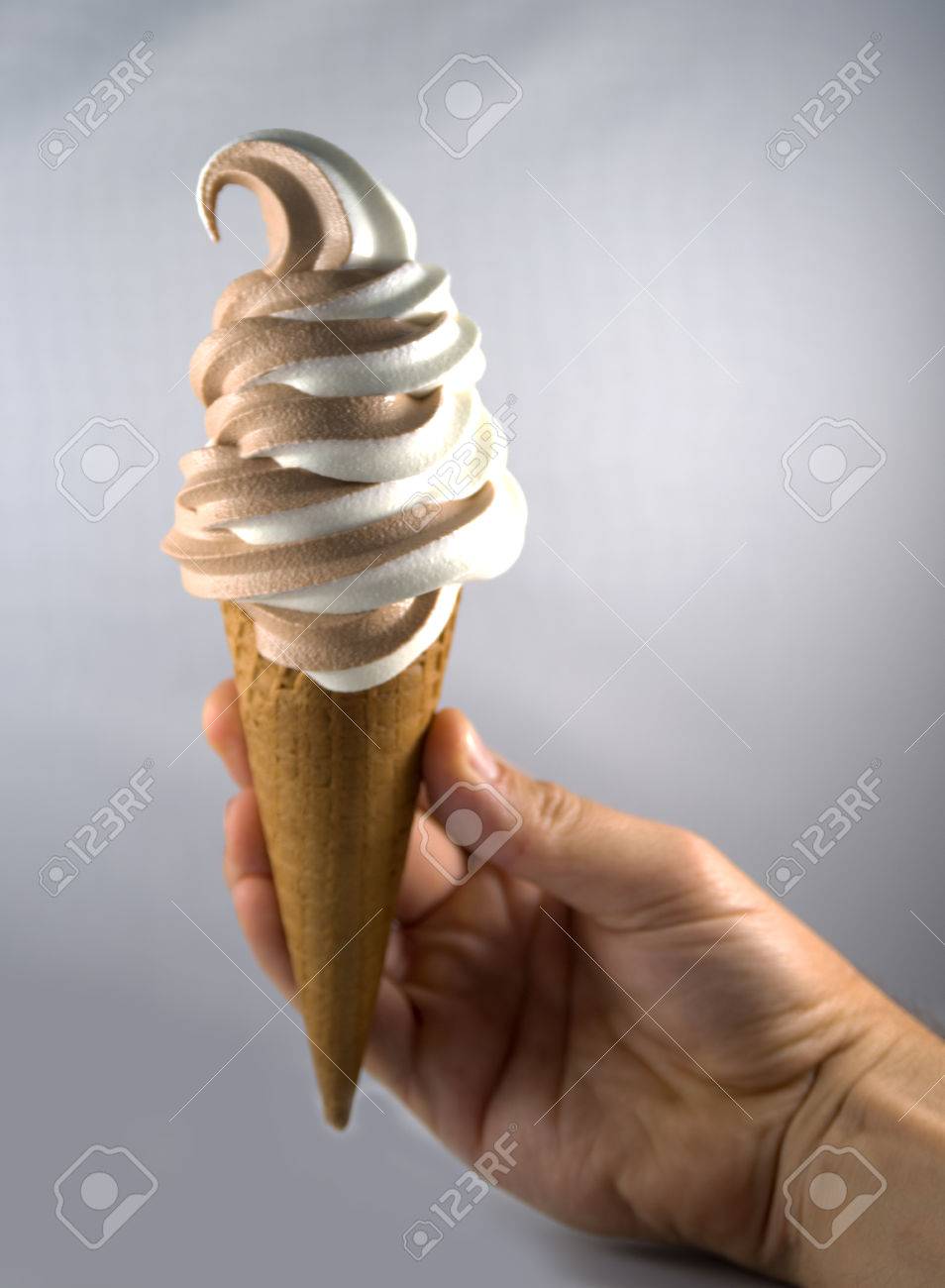 Mixed Vanilla And Chocolate Soft Ice Cream Cone Stock Photo, Picture and  Royalty Free Image. Image 41666299., image size:954x1300