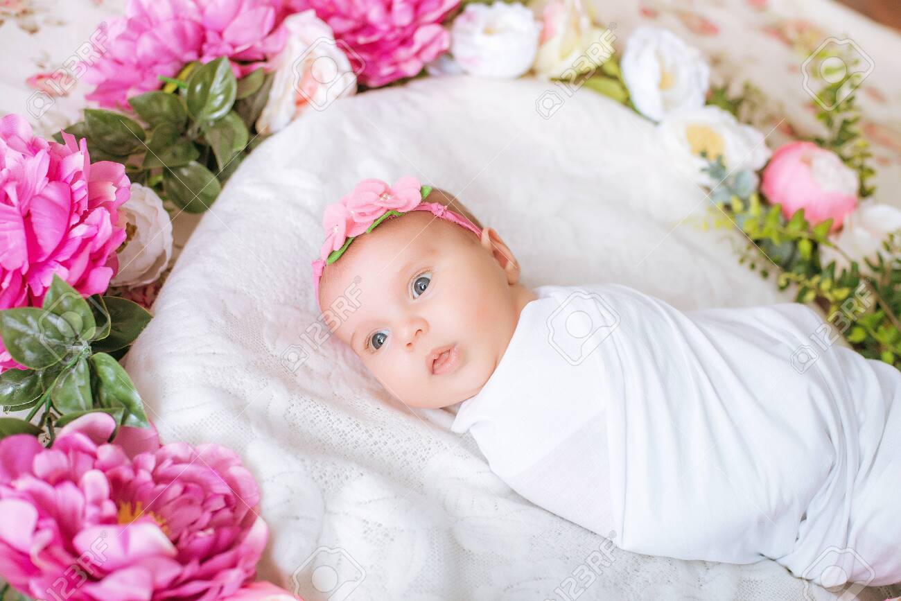baby in a flower