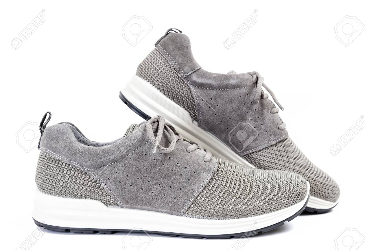 Close Up Of Elegant Gray Sport Shoes For Adult Man Photographed