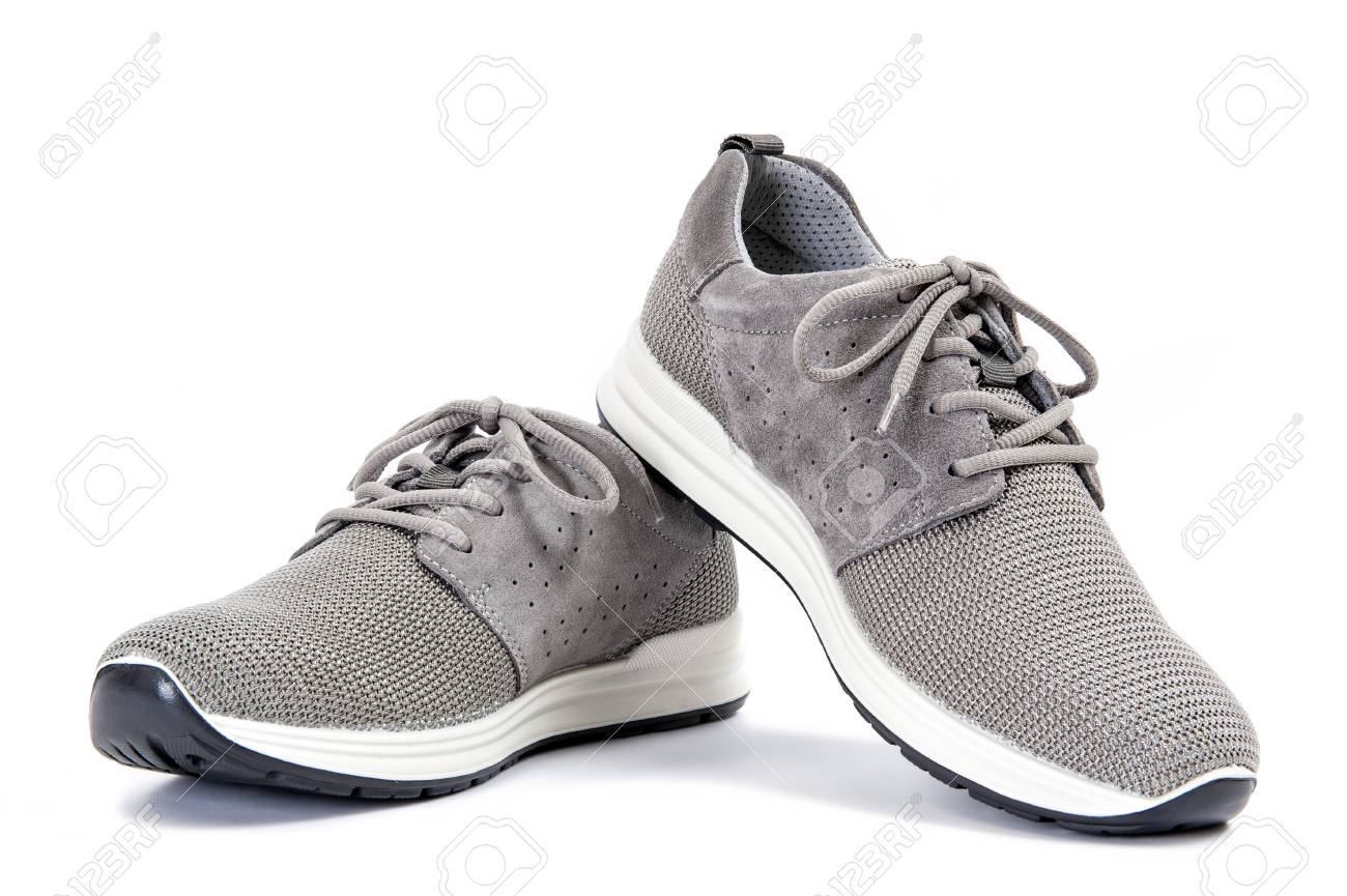 Close Up Of Elegant Gray Sport Shoes For Adult Man Photographed