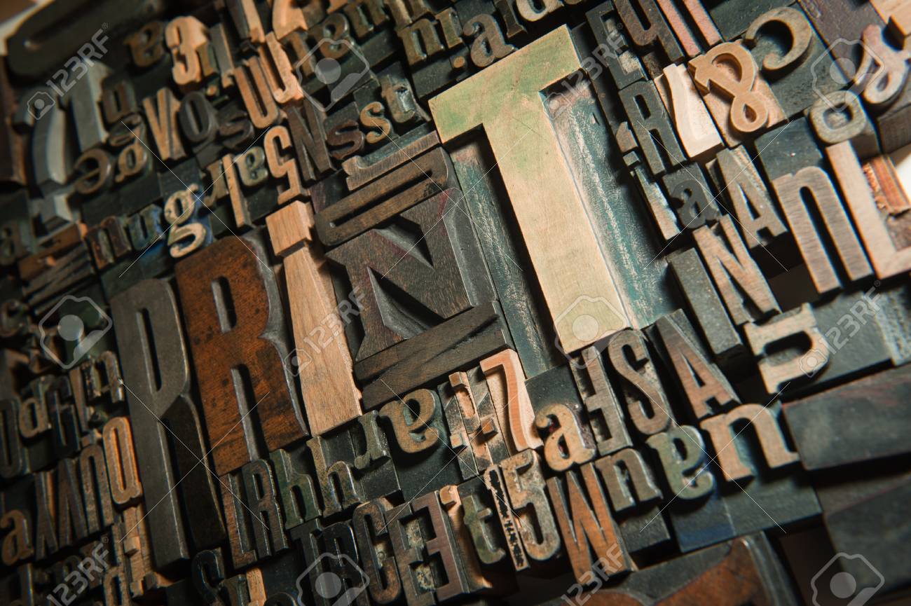 background of vintage wooden letter cases with the word print stock letter cases