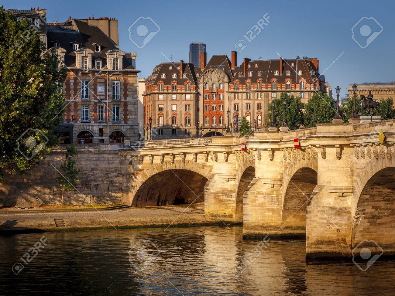 paris at dawn pont neuf across the river seine and the buildings