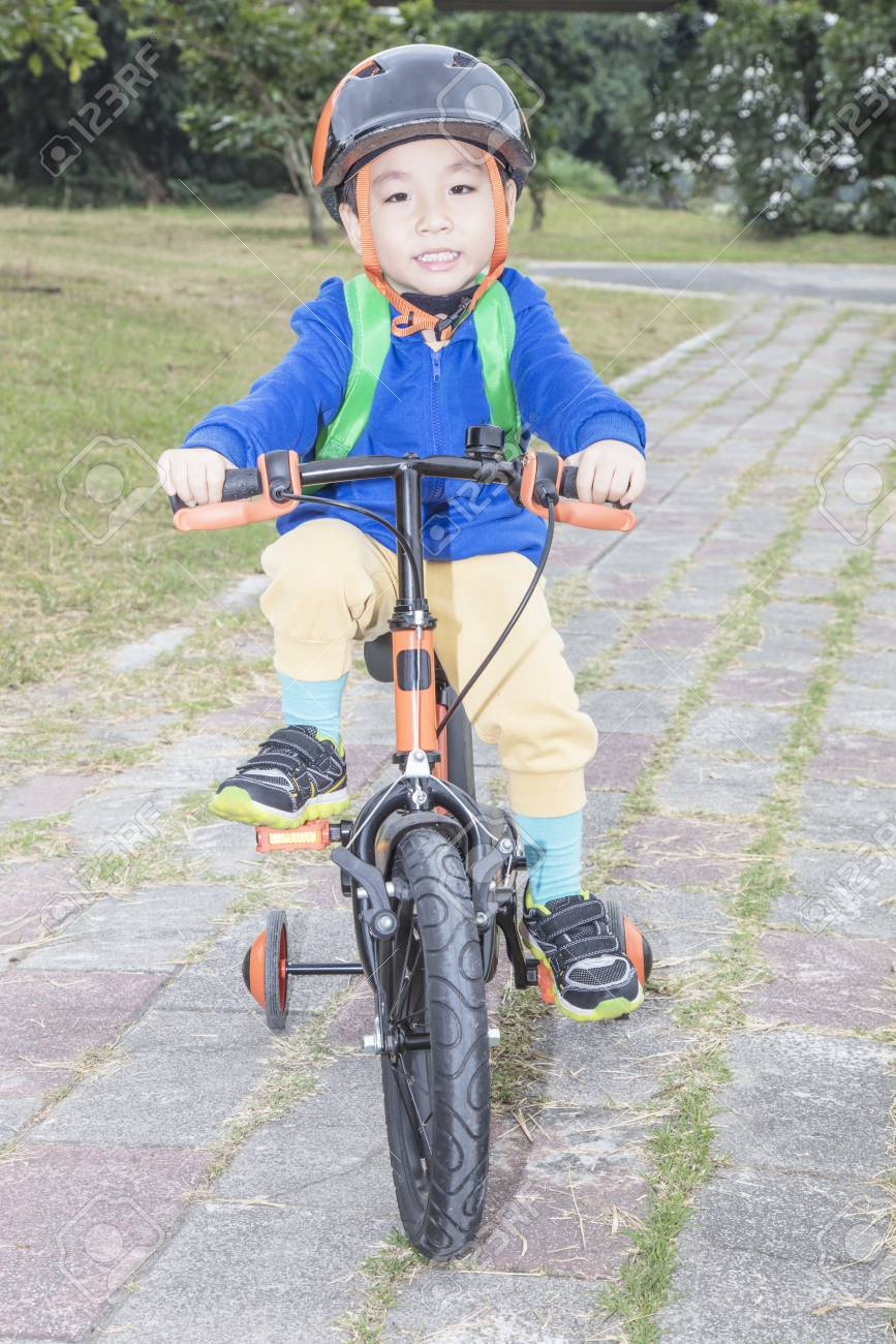 child on bike
