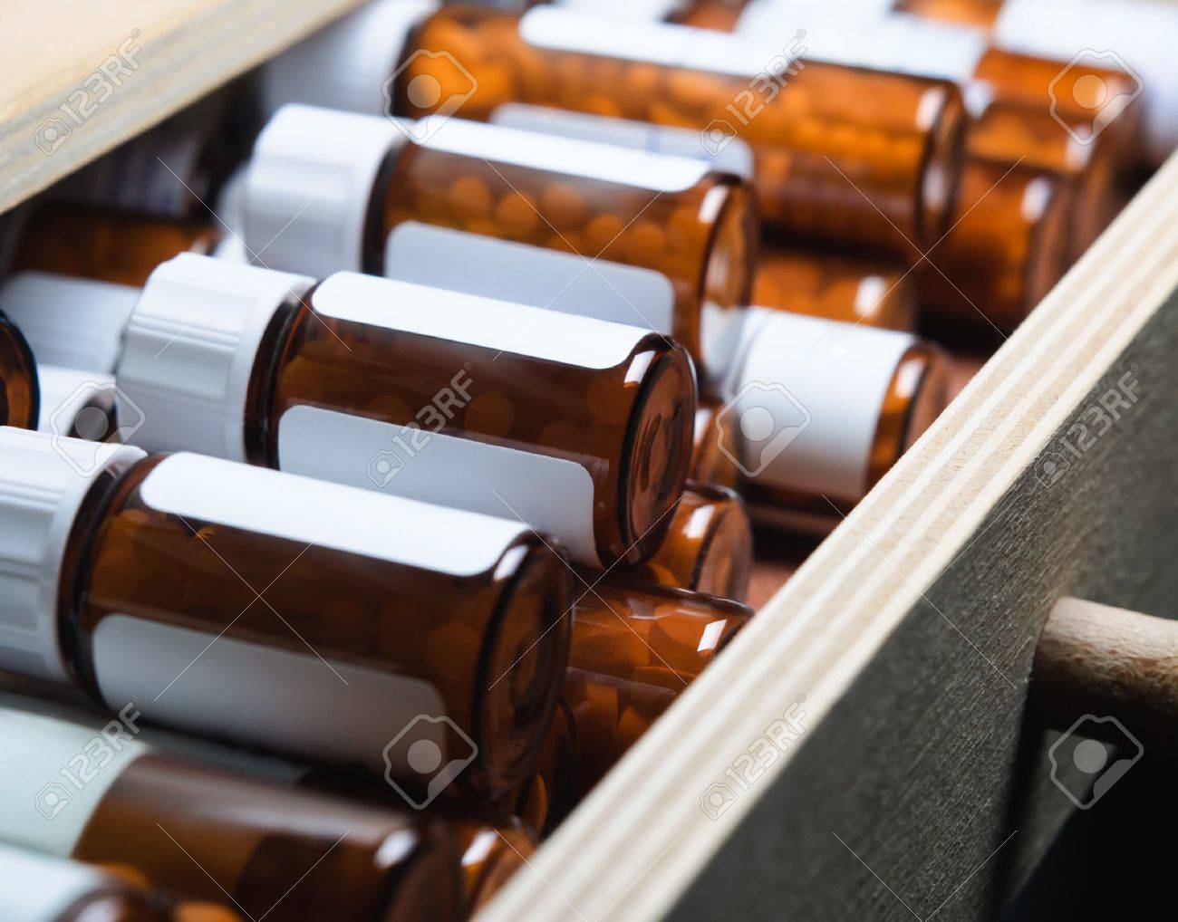 Download An Open Drawer Filled With Many Amber Glass Pill Bottles Containing Stock Photo Picture And Royalty Free Image Image 9948052