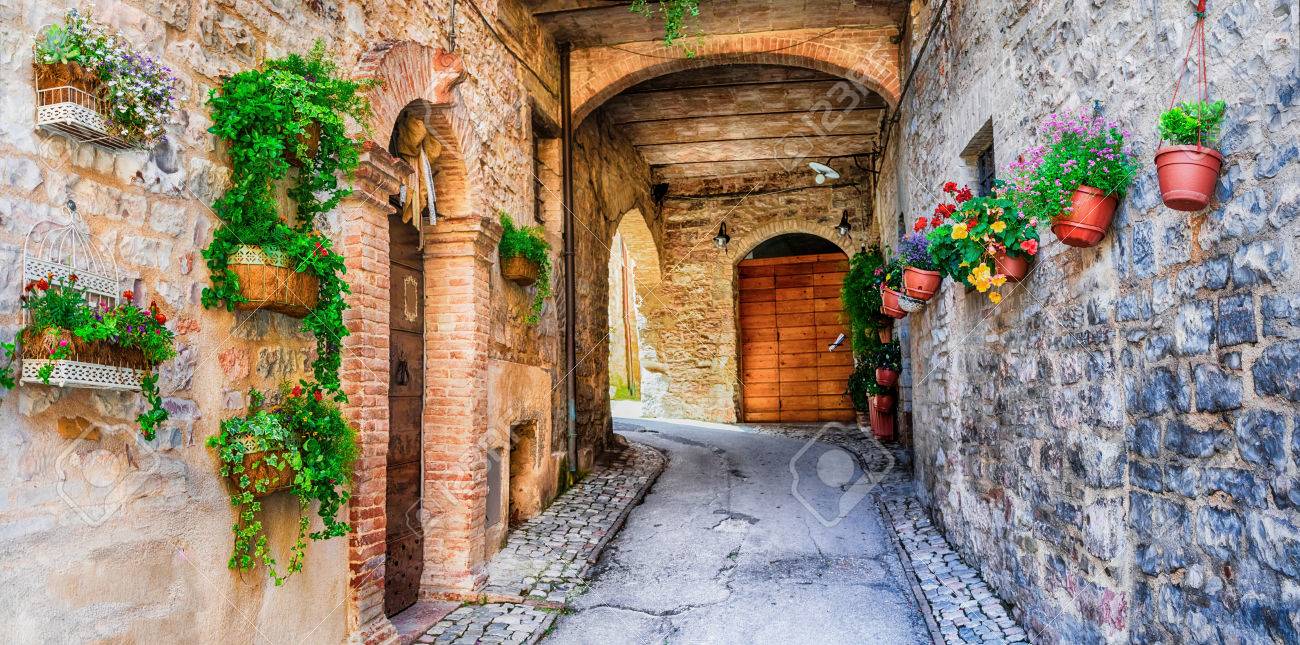 beautiful streets with floral decoration in Spello - medieval village in Italy - 62001027 beautiful streets with floral decoration in Spello - medieval village in Italy - 62001027